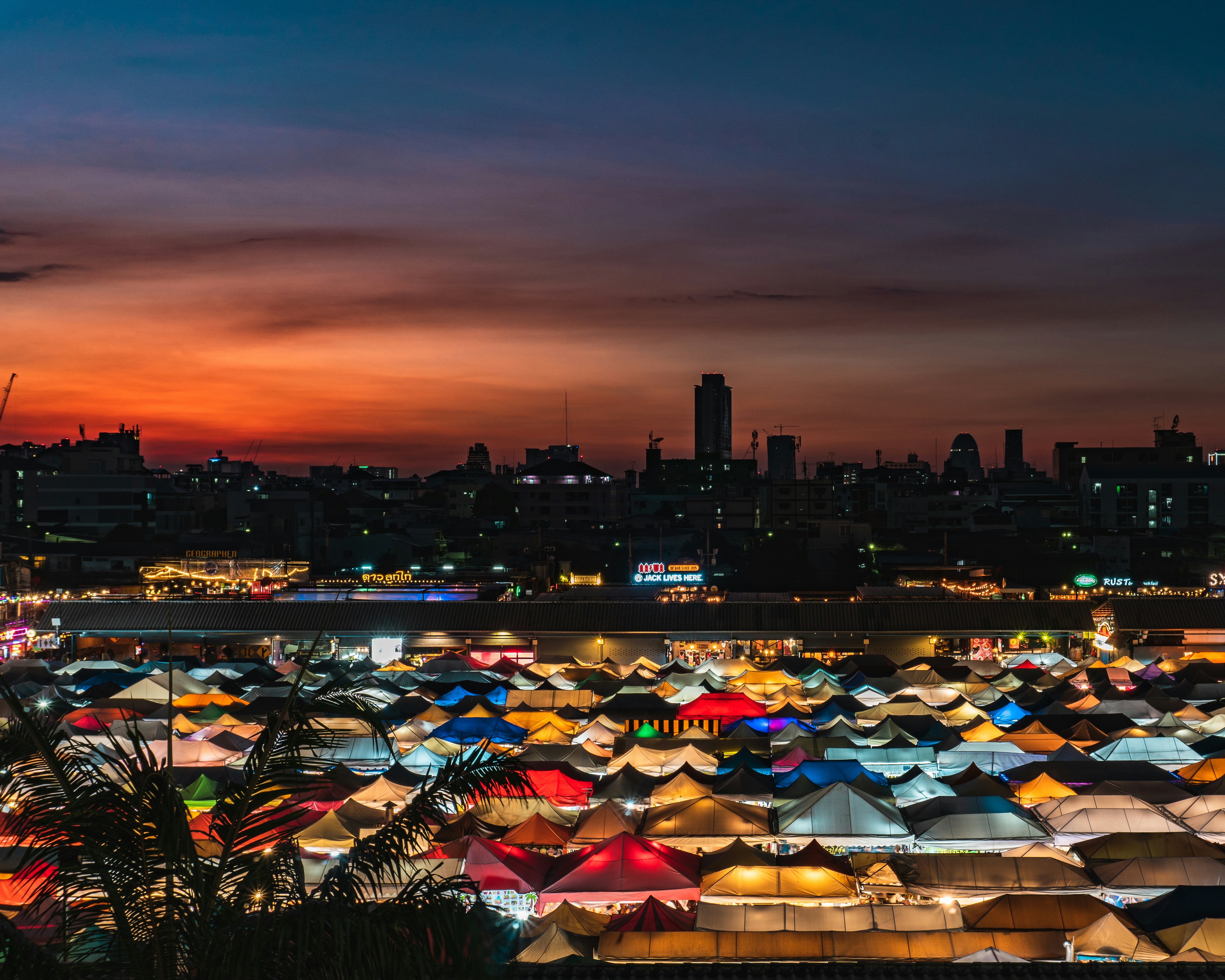 Bangkok Night Markets - Colorful stalls illuminated at night